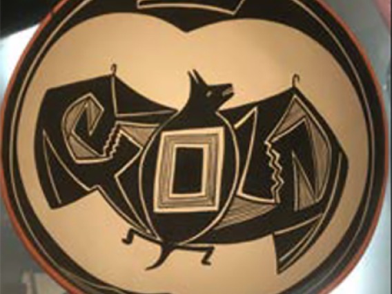 black and white bowl with a depiction of a bat