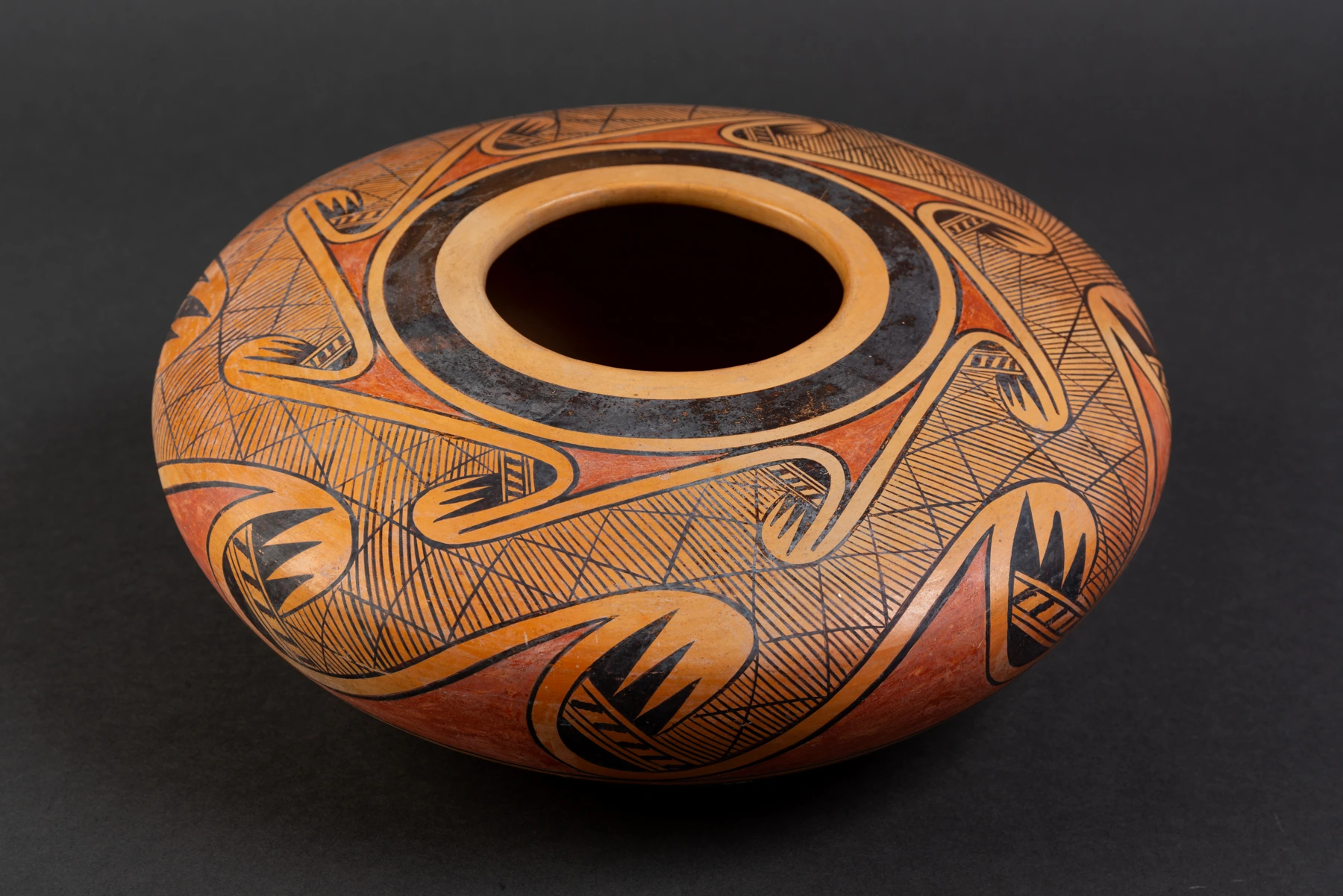polychrome bowl with migration/bird-wing design.